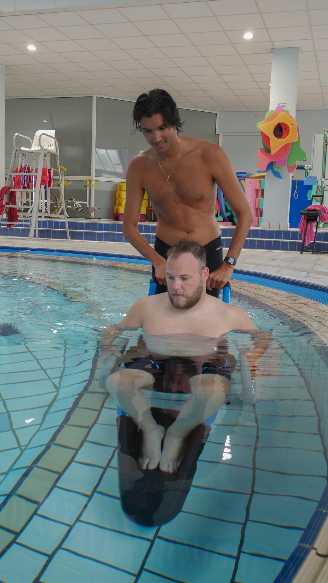 Hippocampe Swimming pool Chair with the chair in the pool
