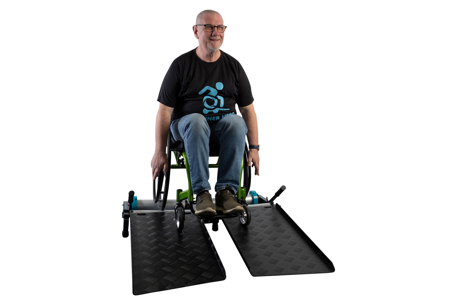 Wheelchair training roller with Man using it. View from a front angle.