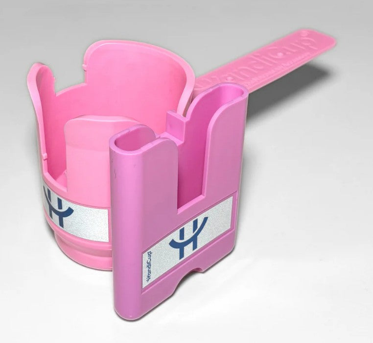 Phone holder attached to the wheelchair cup holder in the color pink