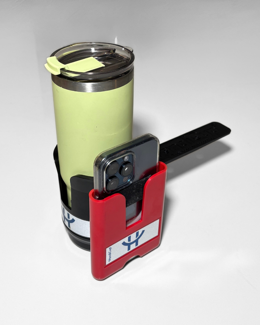 Phone holder attached to the wheelchair cup holder in the color red with a cup