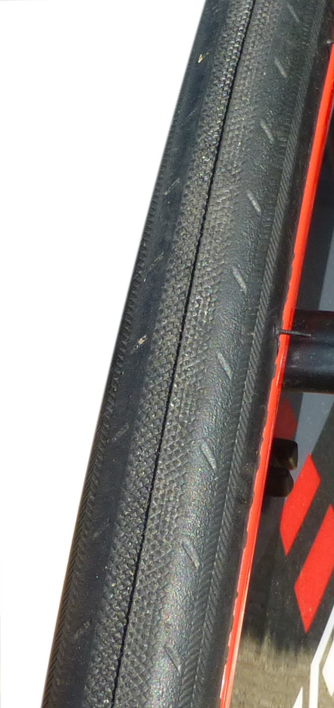 red marathon running push chair tire close up